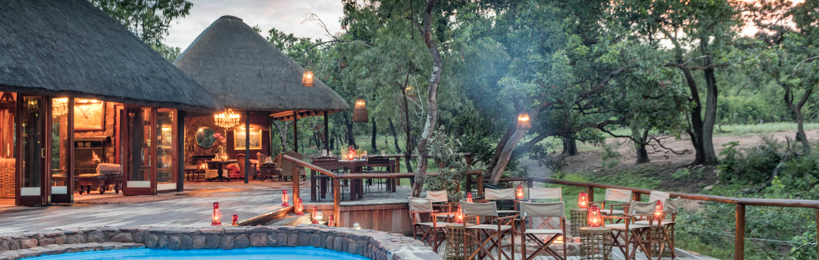 Luxurious accommodation at Camp Ndlovu, blending with rich natural surroundings.